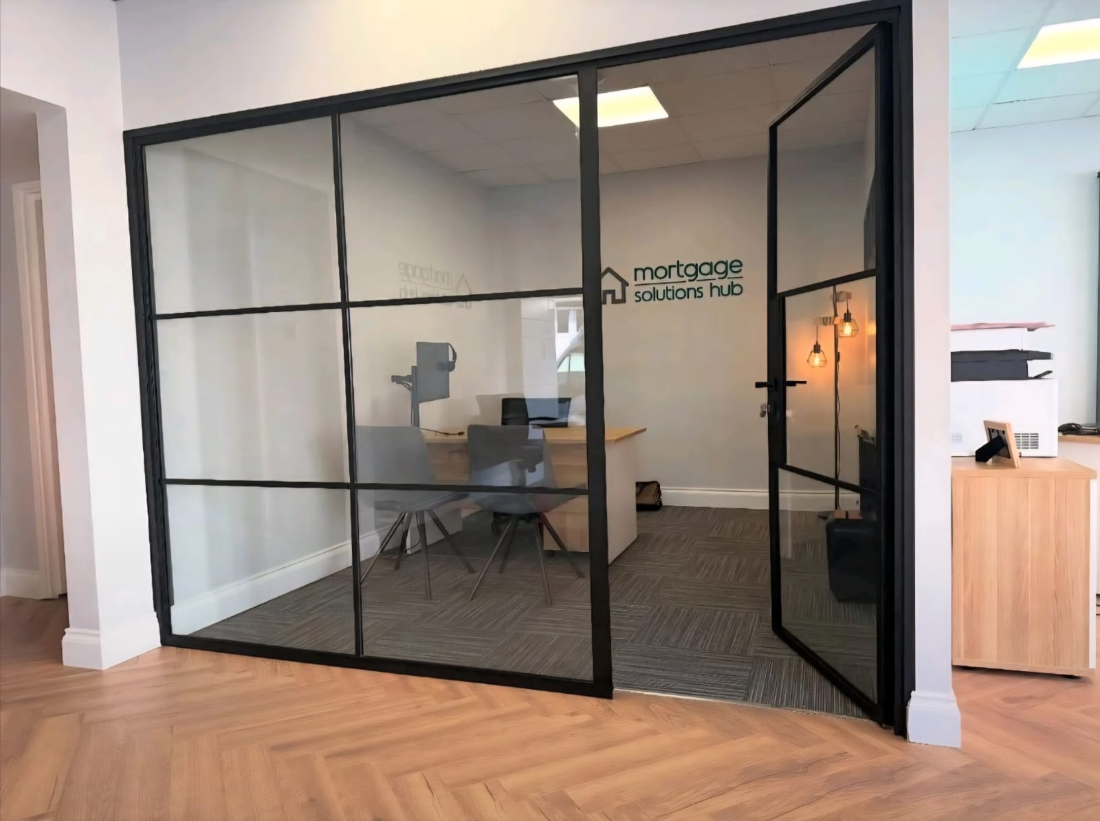 Internal steel door seperating as office space